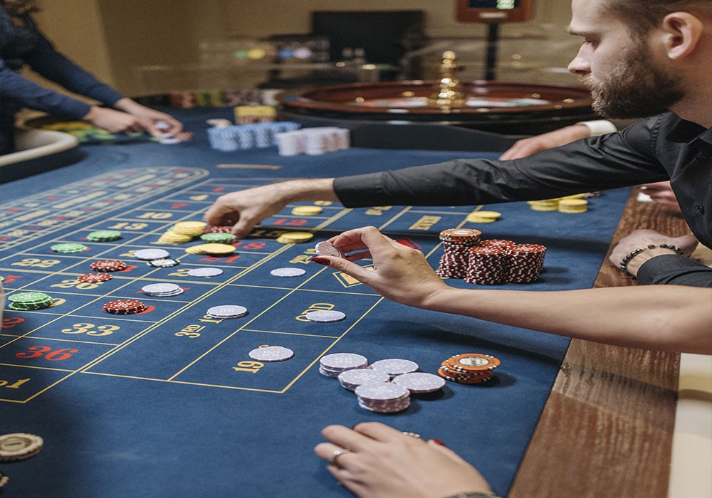 A group fo people playing a poker game